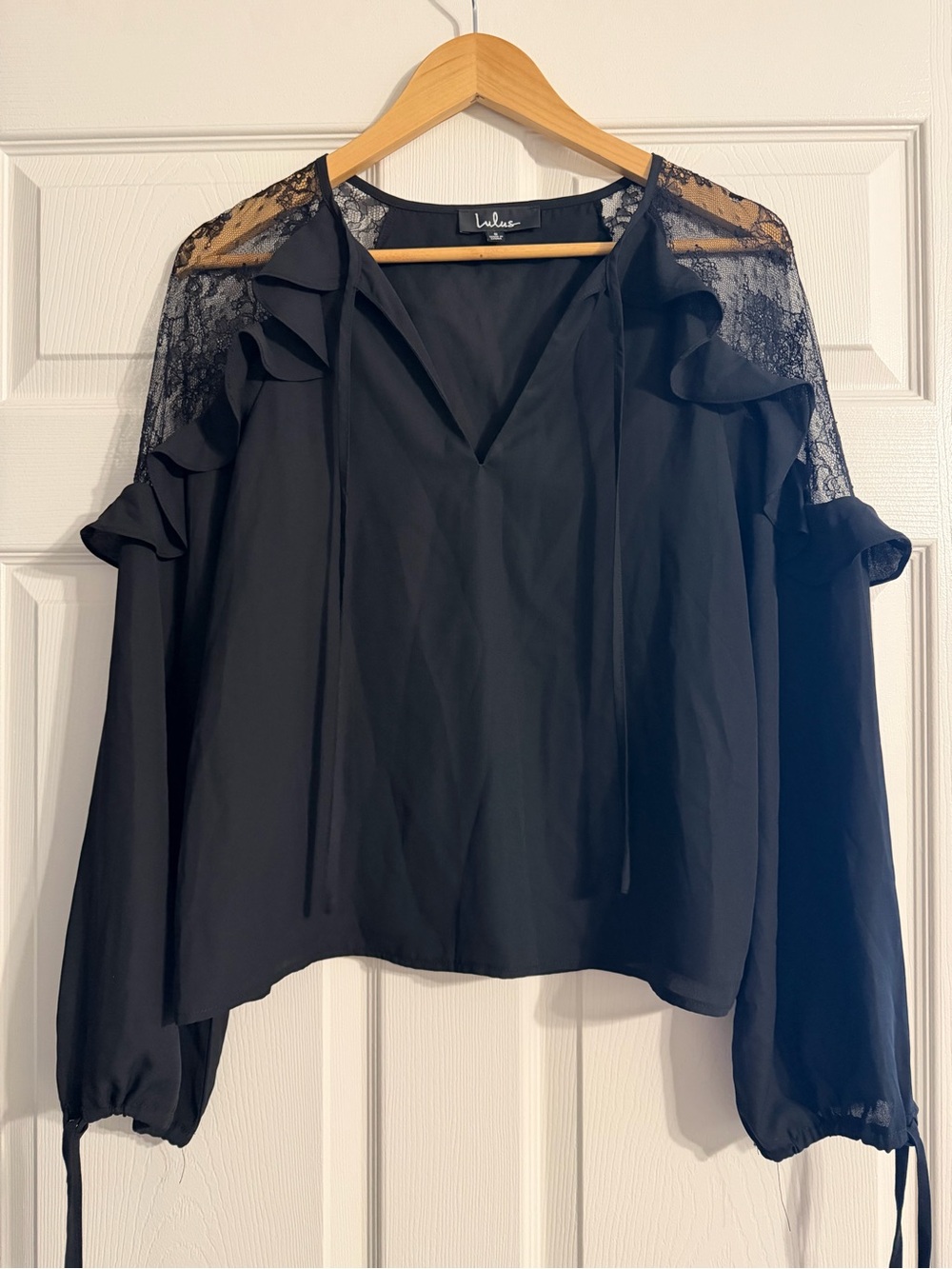 Lulu's Black Lace-Shoulder Ruffle V-Neck Blouse with Tie